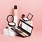 What materials are used to make compact powder containers?