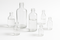 Can UV light damage cosmetics in clear glass bottles?