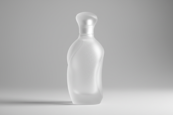 How does frosted glass bottle enhance the perception of a high-end product?