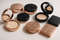 Why do some makeup compact cases have magnetic closures?