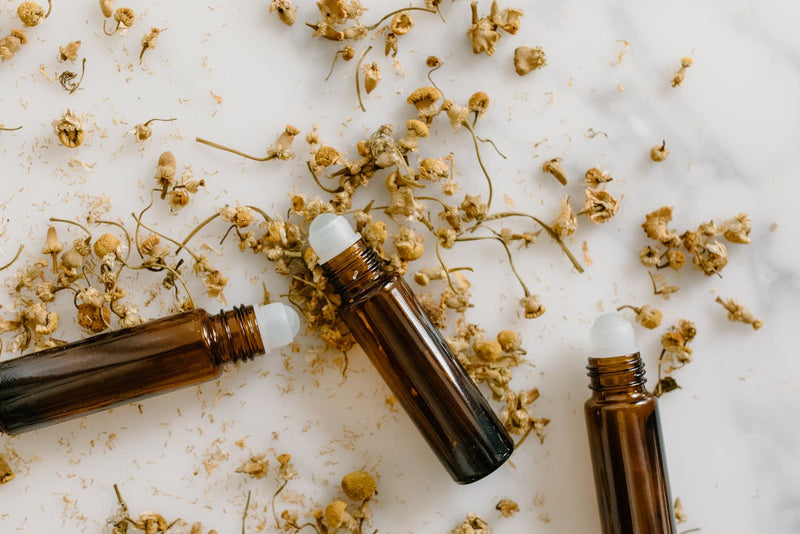 What are the benefits of using roll-on bottles for essential oils?