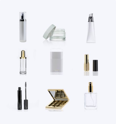 An assortment of skincare packaging — a frosted pump bottle, glass jar, dropper, tube, compact and perfume bottle